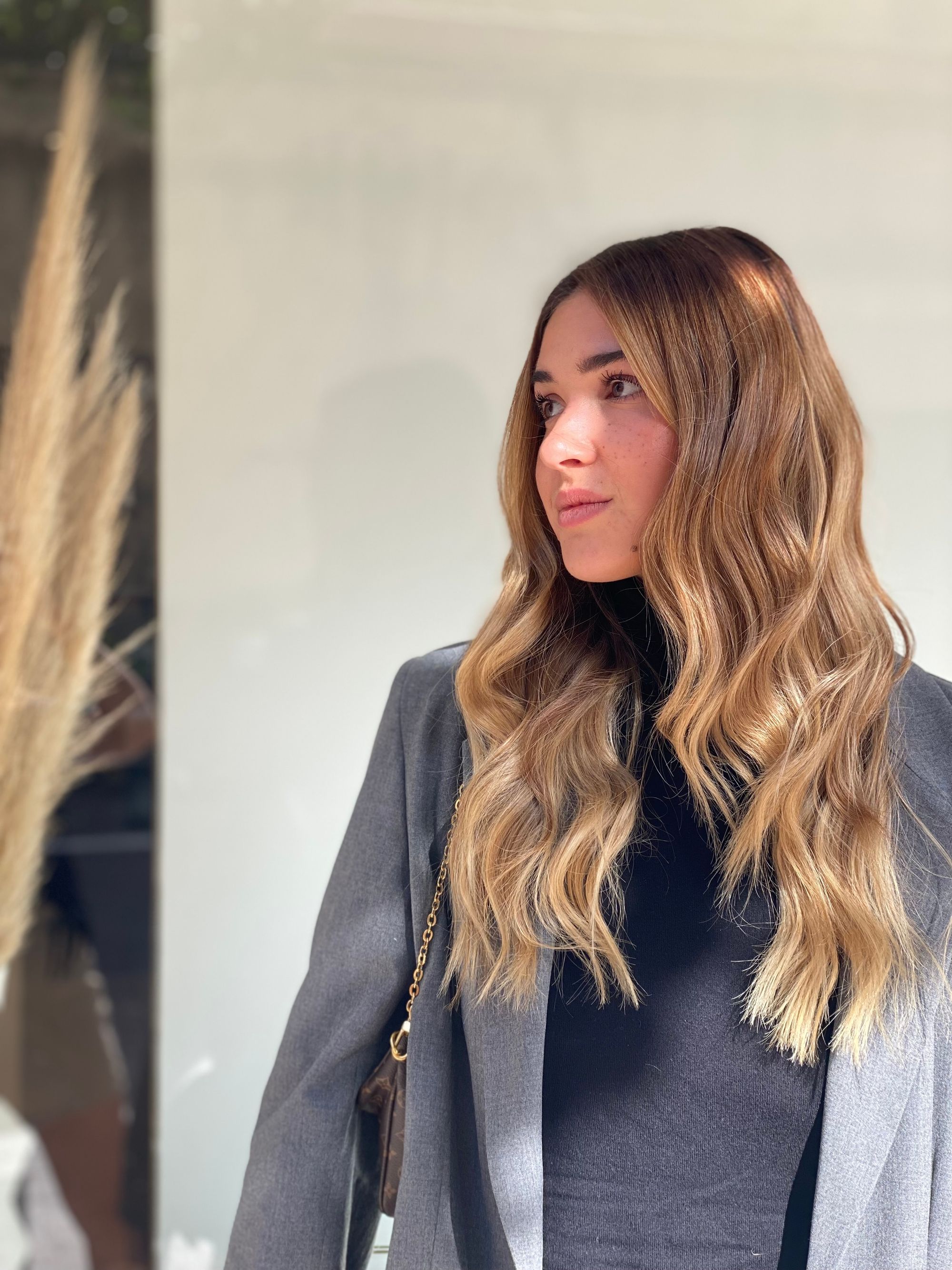 Sun-kissed bronde hair in profile